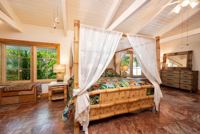 bedroom with vaulted ceiling with beams and wood ceiling