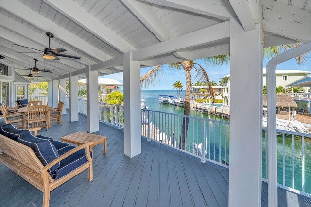 218 Bristol Ct, Tavernier, FL 33070 - wooden deck with a water view and ceiling fan