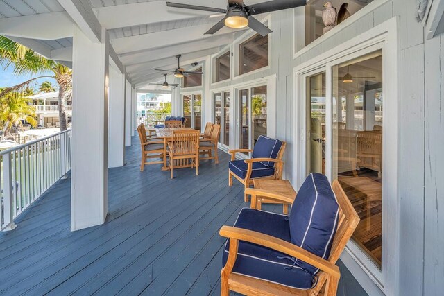 218 Bristol Ct, Tavernier, FL 33070 - wooden deck featuring ceiling fan and outdoor dining space