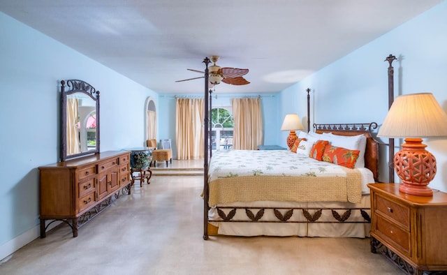 bedroom featuring concrete floors and ceiling fan