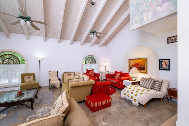 living room with beamed ceiling, plenty of natural light, high vaulted ceiling, and wooden ceiling