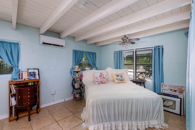 bedroom with beamed ceiling, wood ceiling, a wall unit AC, and light tile patterned floors