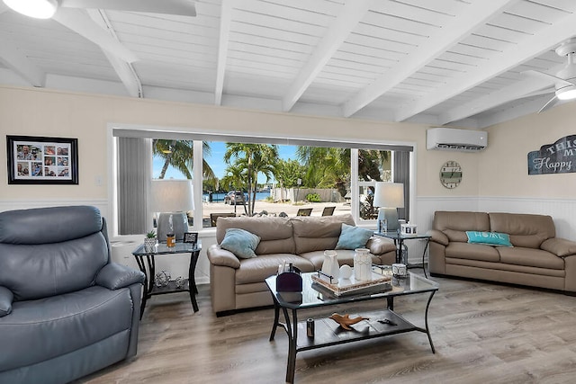 living room with beamed ceiling, wood ceiling, hardwood / wood-style flooring, and an AC wall unit