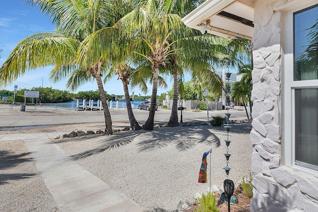 view of home's community featuring a water view