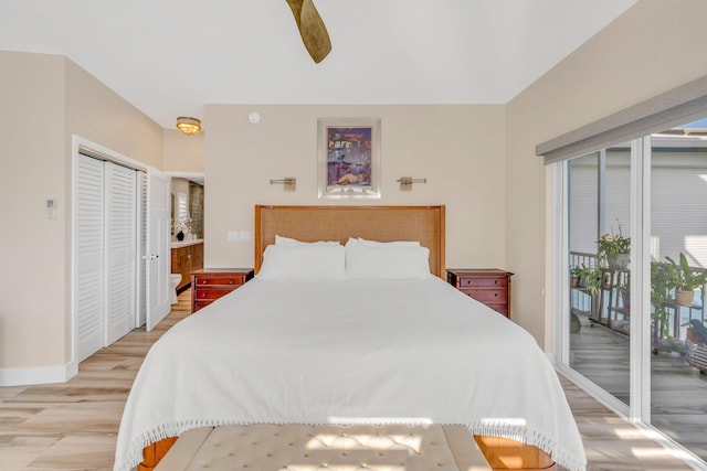 bedroom featuring access to exterior, light wood finished floors, a closet, a ceiling fan, and baseboards