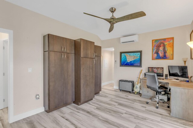 office space featuring light wood-style flooring, baseboards, a ceiling fan, and a wall mounted AC