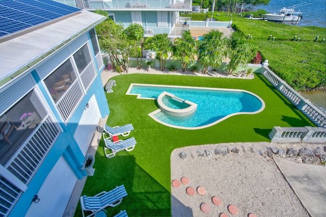 view of pool with a water view