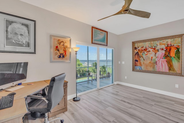 office featuring ceiling fan and light hardwood / wood-style flooring