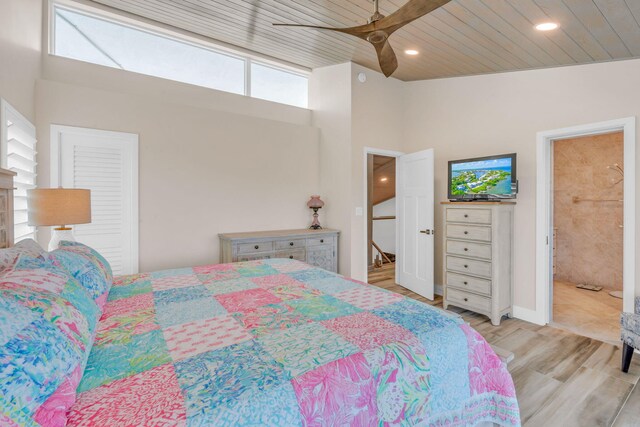 bedroom with ensuite bath, vaulted ceiling, wooden ceiling, light wood-type flooring, and ceiling fan