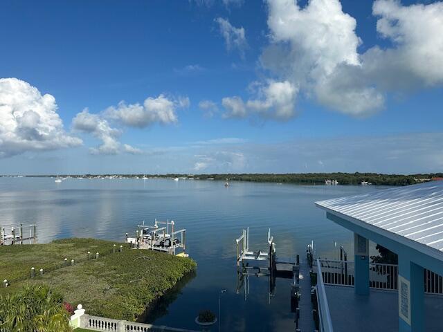 view of water feature with a boat dock and boat lift