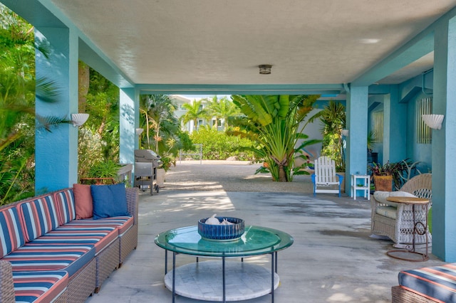 view of patio featuring area for grilling and an outdoor hangout area