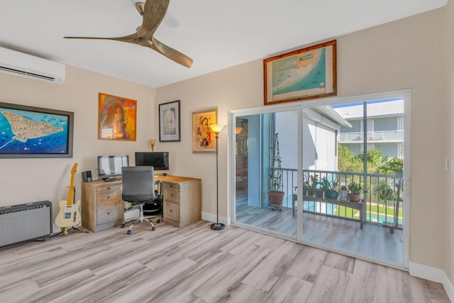 office area with ceiling fan, a wall mounted air conditioner, radiator, and light hardwood / wood-style floors