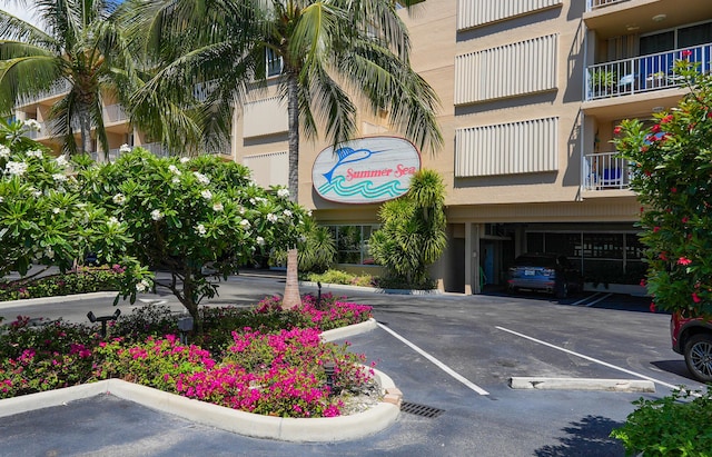 88500 Overseas Hwy Unit 508, Islamorada, FL 33070 - view of property featuring uncovered parking