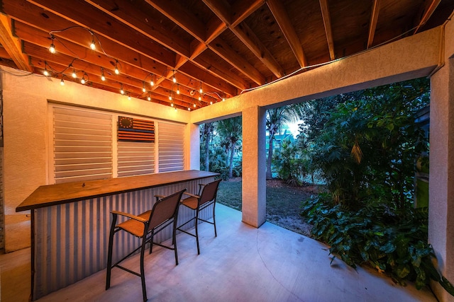 view of patio featuring a bar