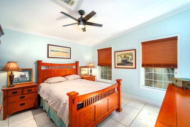 tiled bedroom featuring ceiling fan, ornamental molding, and vaulted ceiling