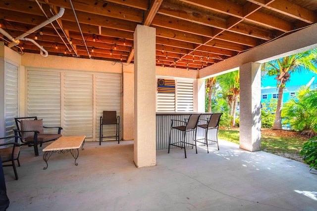 view of patio / terrace with exterior bar