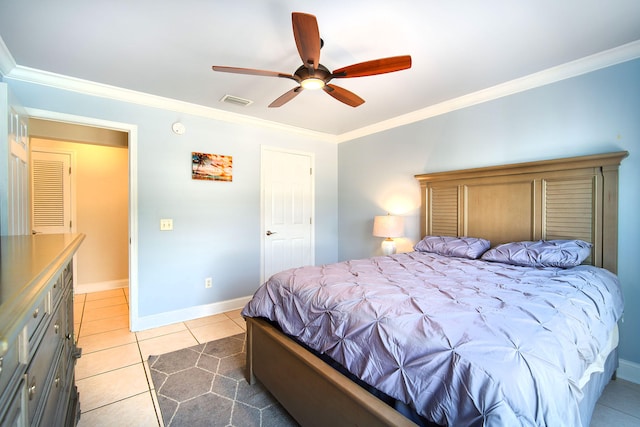 tiled bedroom with crown molding and ceiling fan