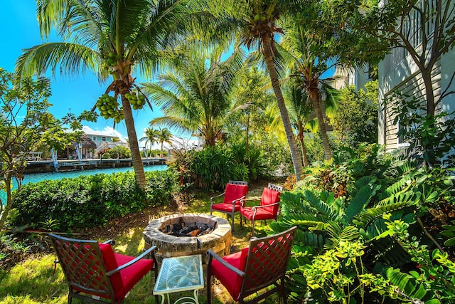 view of patio with a fire pit