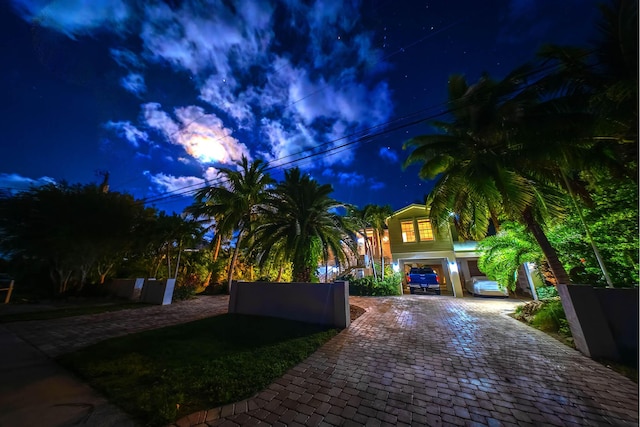 view of front of property with a garage