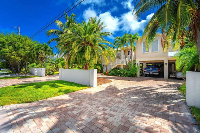 view of front of property featuring a carport