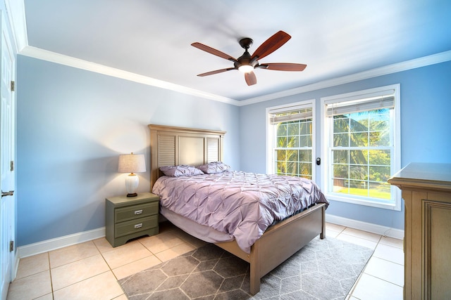 tiled bedroom with crown molding and ceiling fan