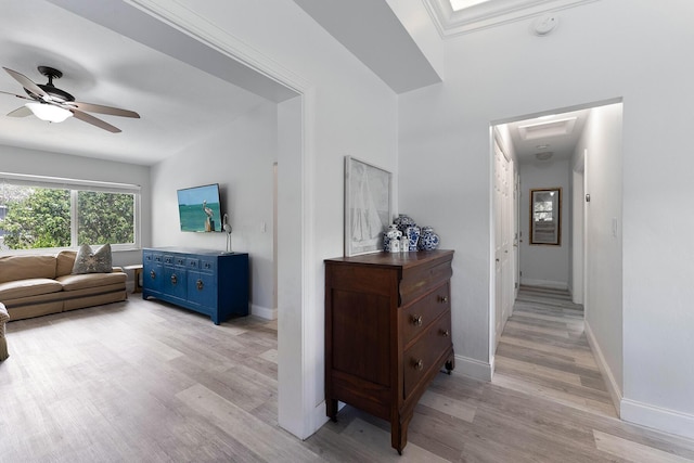 hall with light hardwood / wood-style flooring