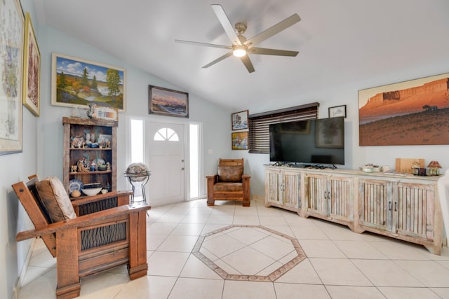 tiled living room featuring vaulted ceiling and ceiling fan