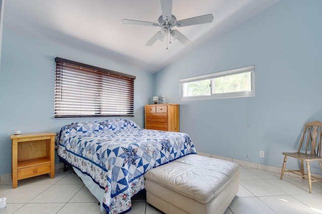 tiled bedroom featuring vaulted ceiling and ceiling fan