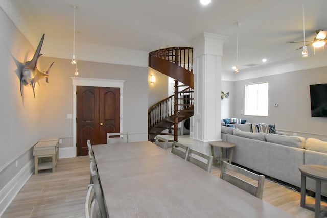 living area with a ceiling fan, stairs, light wood-style flooring, and recessed lighting