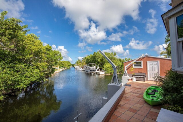 property view of water with a dock