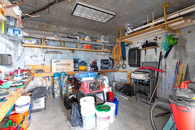 garage with a workshop area