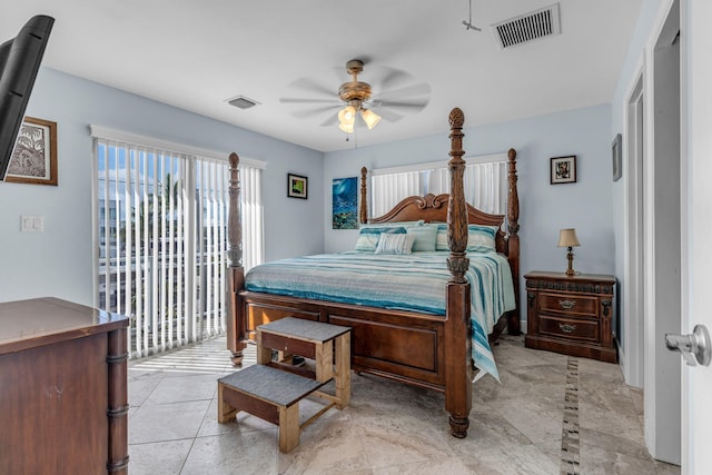 bedroom with access to outside and ceiling fan