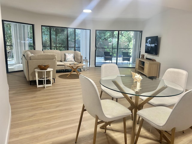 dining room with light wood-type flooring