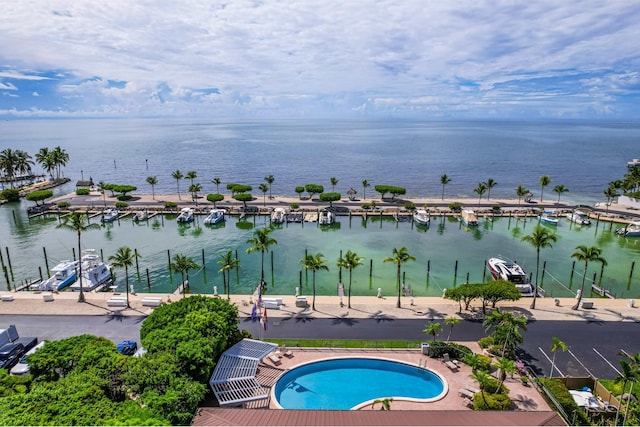 birds eye view of property featuring a water view