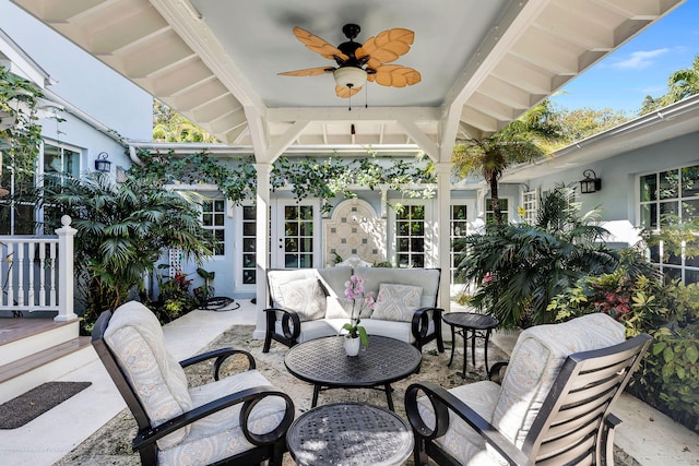 view of patio featuring ceiling fan and french doors