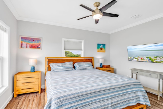 1777 Pine Channel Dr, Little Torch, FL 33042 - bedroom with ornamental molding, wood finished floors, and ceiling fan