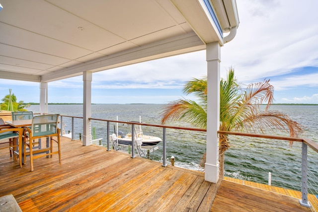 1777 Pine Channel Dr, Little Torch, FL 33042 - wooden deck with boat lift, a water view, and a boat dock
