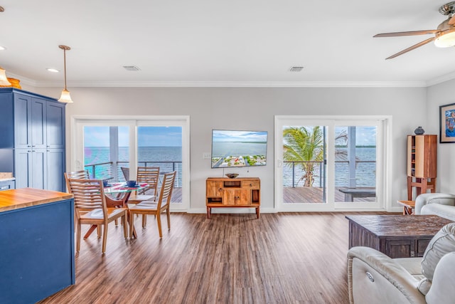 1777 Pine Channel Dr, Little Torch, FL 33042 - living area featuring wood finished floors, ceiling fan, ornamental molding, and recessed lighting