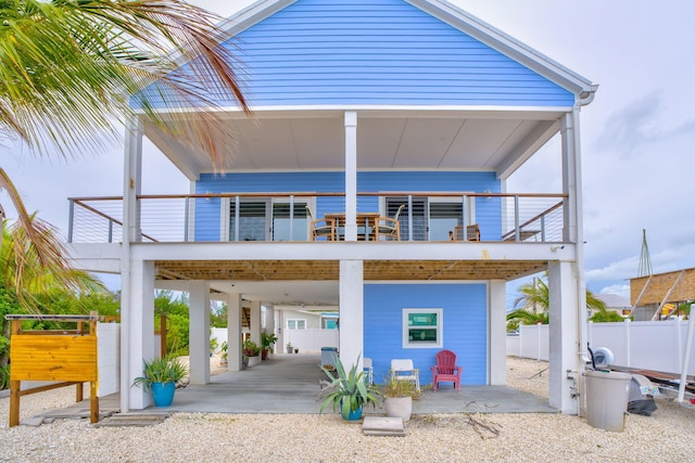 1777 Pine Channel Dr, Little Torch, FL 33042 - rear view of house with a carport and a balcony
