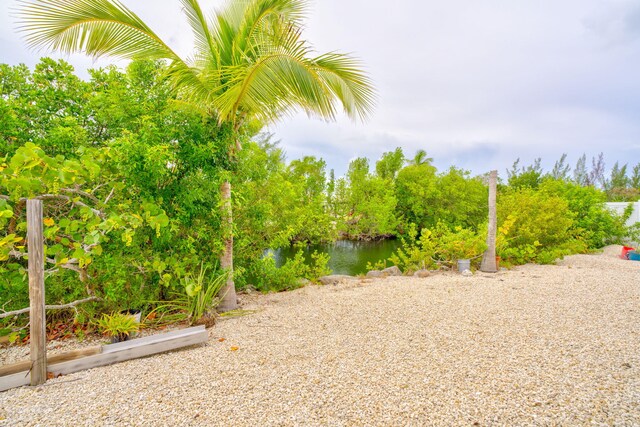 1777 Pine Channel Dr, Little Torch, FL 33042 - view of yard featuring a water view