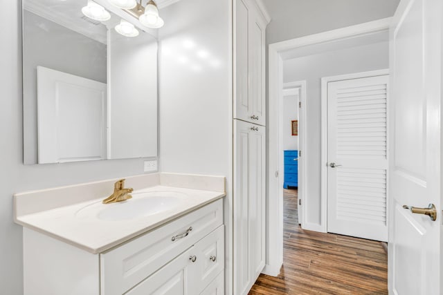 1777 Pine Channel Dr, Little Torch, FL 33042 - bathroom featuring vanity, wood finished floors, and a chandelier