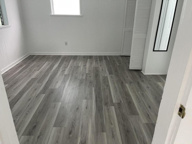 1122 Simonton St, Key West, FL 33040 - empty room with wood finished floors and baseboards