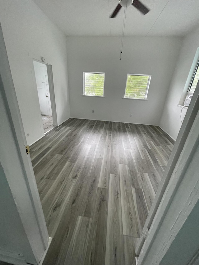 1122 Simonton St, Key West, FL 33040 - unfurnished room featuring wood finished floors and ceiling fan