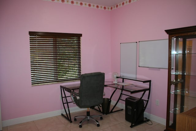 home office with light tile patterned floors