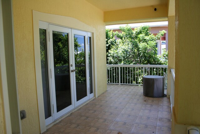 balcony featuring french doors and a patio