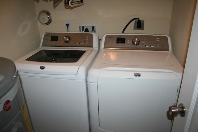 laundry area with separate washer and dryer