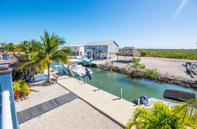 dock area with a water view