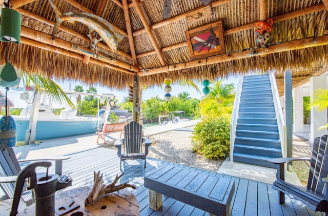 wooden terrace with a gazebo