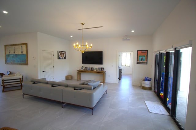 living room featuring recessed lighting, baseboards, a notable chandelier, and visible vents