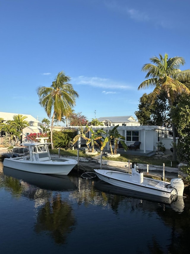 dock area featuring a water view